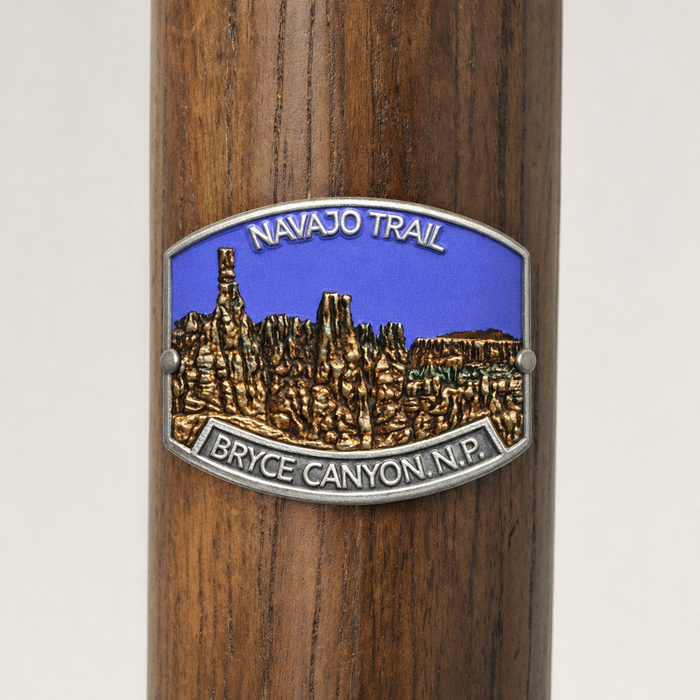 Bryce Canyon National Park Navajo Trail hiking stick medallion installed on a wooden hiking staff