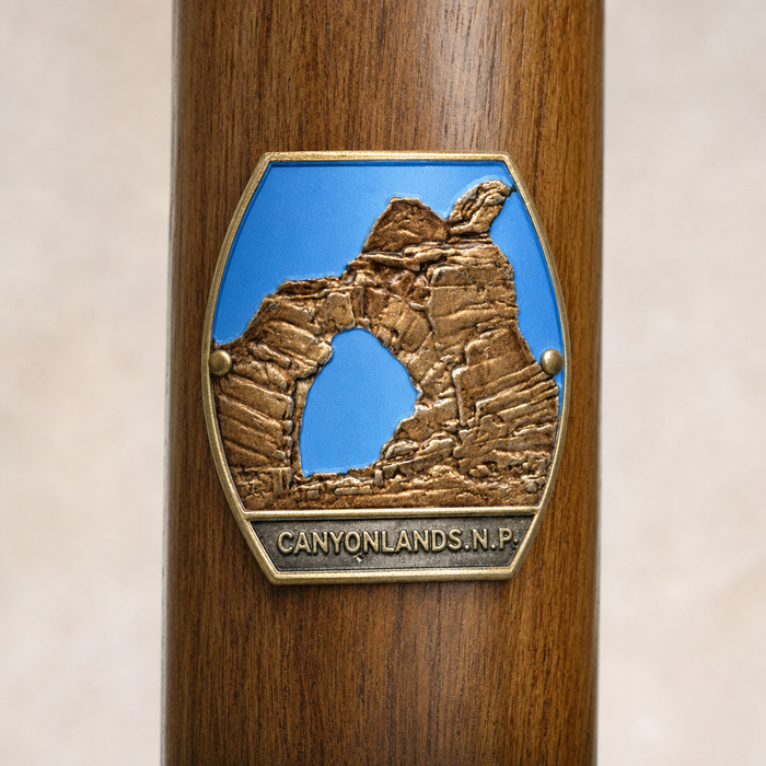 Canyonlands National Park hiking stick medallion installed on a wooden hiking staff