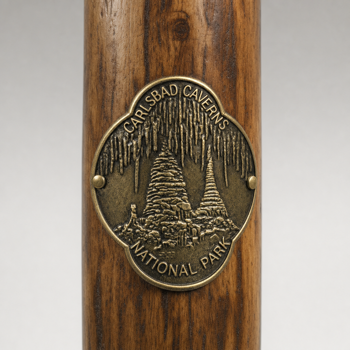 Carlsbad Caverns National Park Cave View hiking stick medallion installed on a wooden hiking staff